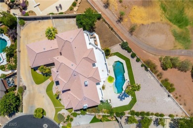 Located in the prestigious guard-gated Grand Legacy golf course on The Legacy Golf Club in Nevada - for sale on GolfHomes.com, golf home, golf lot