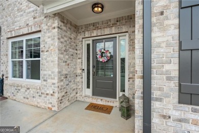 Welcome to this beautiful 5-bedroom, 4-bathroom home located in on Traditions of Braselton Golf Club in Georgia - for sale on GolfHomes.com, golf home, golf lot