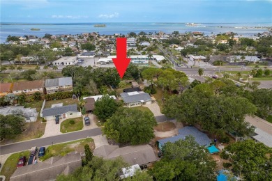 Live the Dunedin dream from this beautifully renovated on The Dunedin Country Club in Florida - for sale on GolfHomes.com, golf home, golf lot