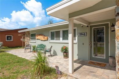 Live the Dunedin dream from this beautifully renovated on The Dunedin Country Club in Florida - for sale on GolfHomes.com, golf home, golf lot