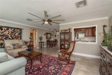Live the Dunedin dream from this beautifully renovated on The Dunedin Country Club in Florida - for sale on GolfHomes.com, golf home, golf lot