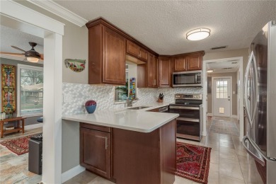 Live the Dunedin dream from this beautifully renovated on The Dunedin Country Club in Florida - for sale on GolfHomes.com, golf home, golf lot
