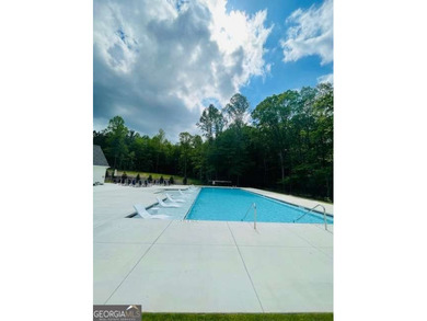 104 Hawks CT LOT 67 Ball Ground, GA Hawks Ridge Golf Club 1.24 on Hawks Ridge Golf Club in Georgia - for sale on GolfHomes.com, golf home, golf lot