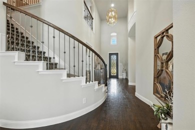 Backed by sweeping golf course views and designed with both on Lantana Golf Club in Texas - for sale on GolfHomes.com, golf home, golf lot