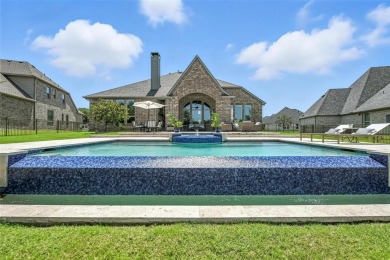 Backed by sweeping golf course views and designed with both on Lantana Golf Club in Texas - for sale on GolfHomes.com, golf home, golf lot