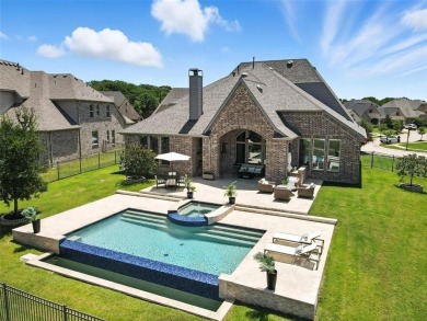 Backed by sweeping golf course views and designed with both on Lantana Golf Club in Texas - for sale on GolfHomes.com, golf home, golf lot