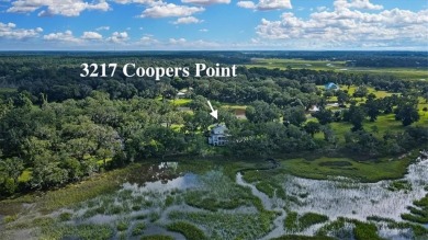 Welcome to your dream home in the picturesque Cooper's Point on Sapelo Hammock Golf Club in Georgia - for sale on GolfHomes.com, golf home, golf lot