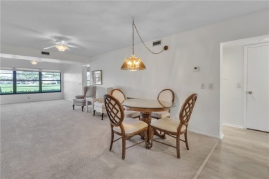 Partially furnished, FIRST FLOOR golfers dream! Favorited floor on Vista Plantation Golf Club in Florida - for sale on GolfHomes.com, golf home, golf lot