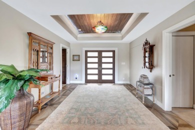 Welcome Home!  Do not miss this beautifully reimagined pool home on Hamlet Country Club in Florida - for sale on GolfHomes.com, golf home, golf lot