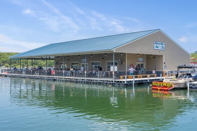 Walk-In Level, Lake View, and Low-Maintenance Living!Welcome to on Kimberling City Golf Club in Missouri - for sale on GolfHomes.com, golf home, golf lot