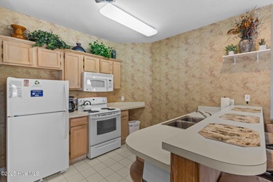 Vacation Living at Its Finest! Welcome to 213 Kings Trail, Unit on Sea Trail Golf Resort in North Carolina - for sale on GolfHomes.com, golf home, golf lot