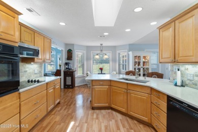 Discover this stunning brick home on just under half an acre on Carolina Shores Golf Course in North Carolina - for sale on GolfHomes.com, golf home, golf lot
