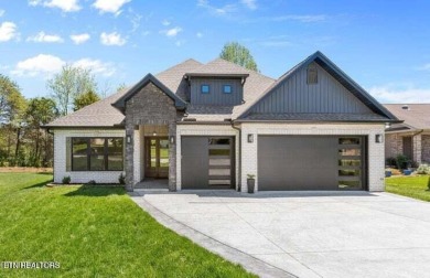 Discover refined living in this all-brick, custom new build in on Toqua Golf Course - Loudon County in Tennessee - for sale on GolfHomes.com, golf home, golf lot