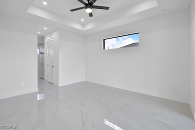 Experience elevated Florida living in this exceptional new on Burnt Store Golf Club in Florida - for sale on GolfHomes.com, golf home, golf lot