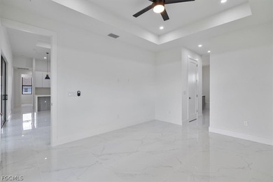 Experience elevated Florida living in this exceptional new on Burnt Store Golf Club in Florida - for sale on GolfHomes.com, golf home, golf lot