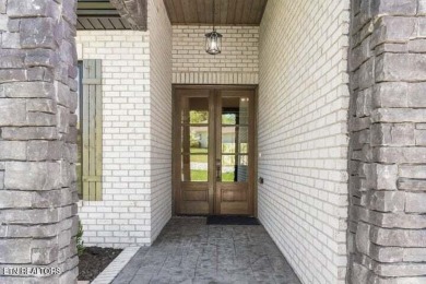 Discover refined living in this all-brick, custom new build in on Toqua Golf Course - Loudon County in Tennessee - for sale on GolfHomes.com, golf home, golf lot