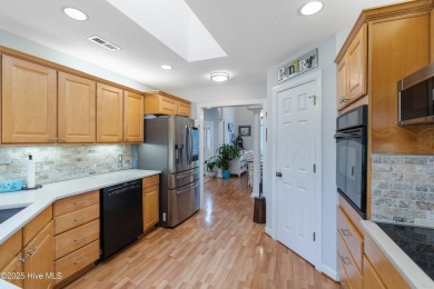 Discover this stunning brick home on just under half an acre on Carolina Shores Golf Course in North Carolina - for sale on GolfHomes.com, golf home, golf lot