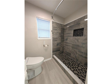 This home has an excellent location! Three blocks from Corpus on Oso Beach Municipal Golf Course in Texas - for sale on GolfHomes.com, golf home, golf lot