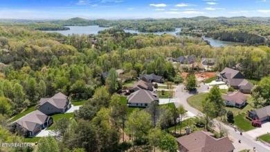 Discover refined living in this all-brick, custom new build in on Toqua Golf Course - Loudon County in Tennessee - for sale on GolfHomes.com, golf home, golf lot
