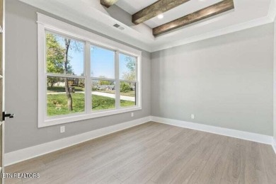 Discover refined living in this all-brick, custom new build in on Toqua Golf Course - Loudon County in Tennessee - for sale on GolfHomes.com, golf home, golf lot