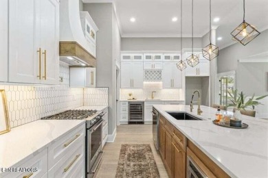 Discover refined living in this all-brick, custom new build in on Toqua Golf Course - Loudon County in Tennessee - for sale on GolfHomes.com, golf home, golf lot