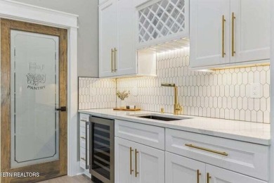 Discover refined living in this all-brick, custom new build in on Toqua Golf Course - Loudon County in Tennessee - for sale on GolfHomes.com, golf home, golf lot