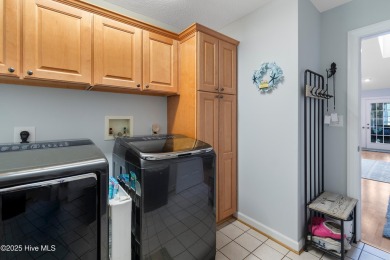 Discover this stunning brick home on just under half an acre on Carolina Shores Golf Course in North Carolina - for sale on GolfHomes.com, golf home, golf lot