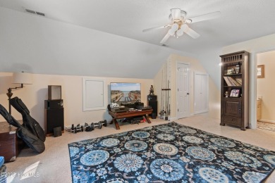 Discover this stunning brick home on just under half an acre on Carolina Shores Golf Course in North Carolina - for sale on GolfHomes.com, golf home, golf lot
