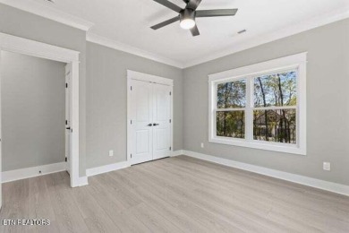 Discover refined living in this all-brick, custom new build in on Toqua Golf Course - Loudon County in Tennessee - for sale on GolfHomes.com, golf home, golf lot