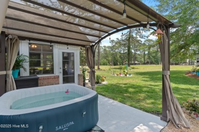 Discover this stunning brick home on just under half an acre on Carolina Shores Golf Course in North Carolina - for sale on GolfHomes.com, golf home, golf lot