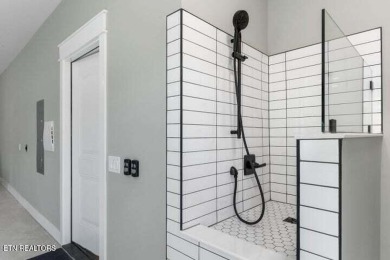 Discover refined living in this all-brick, custom new build in on Toqua Golf Course - Loudon County in Tennessee - for sale on GolfHomes.com, golf home, golf lot