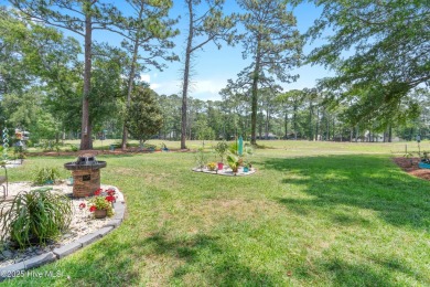 Discover this stunning brick home on just under half an acre on Carolina Shores Golf Course in North Carolina - for sale on GolfHomes.com, golf home, golf lot