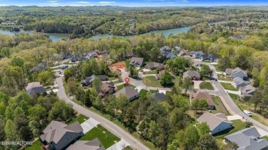 Discover refined living in this all-brick, custom new build in on Toqua Golf Course - Loudon County in Tennessee - for sale on GolfHomes.com, golf home, golf lot