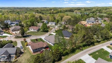 Discover refined living in this all-brick, custom new build in on Toqua Golf Course - Loudon County in Tennessee - for sale on GolfHomes.com, golf home, golf lot