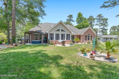 Discover this stunning brick home on just under half an acre on Carolina Shores Golf Course in North Carolina - for sale on GolfHomes.com, golf home, golf lot