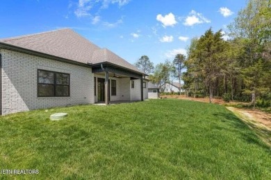 Discover refined living in this all-brick, custom new build in on Toqua Golf Course - Loudon County in Tennessee - for sale on GolfHomes.com, golf home, golf lot