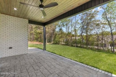 Discover refined living in this all-brick, custom new build in on Toqua Golf Course - Loudon County in Tennessee - for sale on GolfHomes.com, golf home, golf lot