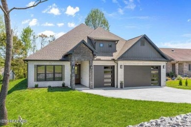 Discover refined living in this all-brick, custom new build in on Toqua Golf Course - Loudon County in Tennessee - for sale on GolfHomes.com, golf home, golf lot