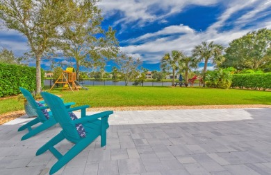 Welcome to this stunning estate home nestled within a premier on Hammock Creek Golf Club in Florida - for sale on GolfHomes.com, golf home, golf lot
