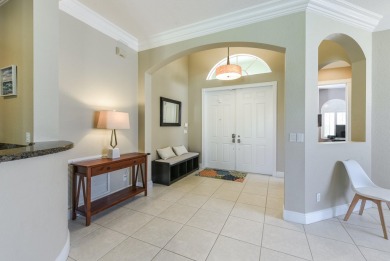 Welcome to this stunning estate home nestled within a premier on Hammock Creek Golf Club in Florida - for sale on GolfHomes.com, golf home, golf lot