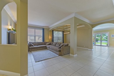 Welcome to this stunning estate home nestled within a premier on Hammock Creek Golf Club in Florida - for sale on GolfHomes.com, golf home, golf lot
