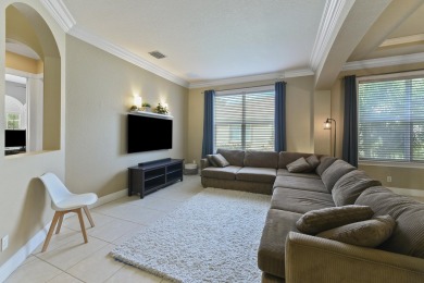 Welcome to this stunning estate home nestled within a premier on Hammock Creek Golf Club in Florida - for sale on GolfHomes.com, golf home, golf lot