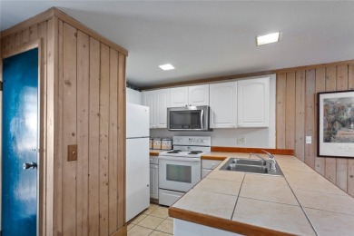 Charming two bedroom, one bath condo in sought-after Keowee Key on Keowee Key Golf and Country Club in South Carolina - for sale on GolfHomes.com, golf home, golf lot