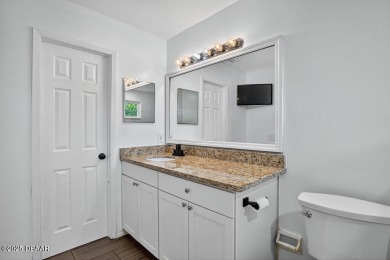 **3.75 ASSUMBALE MORTGAGE**  This home has over 2,000sf of on The Grand Club - Pine Lakes Course in Florida - for sale on GolfHomes.com, golf home, golf lot
