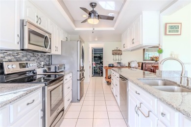 Welcome to this beautifully maintained expanded Oakmont model on Timber Pines Golf Course in Florida - for sale on GolfHomes.com, golf home, golf lot