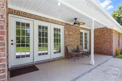 Discover your perfect all-brick Low Country home in the on Henderson Golf Club in Georgia - for sale on GolfHomes.com, golf home, golf lot