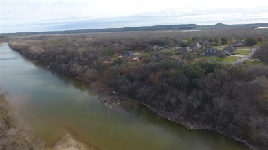 Discover one of the last remaining RIVERFRONT lots in the highly on Pecan Plantation Country Club in Texas - for sale on GolfHomes.com, golf home, golf lot