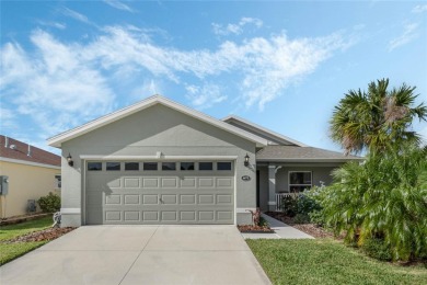 Welcome to your dream home in the highly sought-after 55+ on Arlington Ridge Golf Club in Florida - for sale on GolfHomes.com, golf home, golf lot