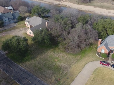 Discover one of the last remaining RIVERFRONT lots in the highly on Pecan Plantation Country Club in Texas - for sale on GolfHomes.com, golf home, golf lot