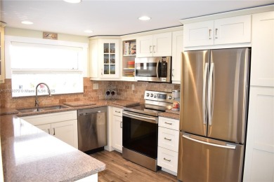 If when you think FLORIDA, you think surf, ocean, sand and the on Sunrise Lakes Phase III in Florida - for sale on GolfHomes.com, golf home, golf lot